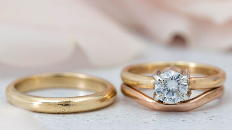 Wedding band and engagement ring up close