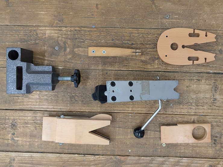 Various wooden and steel bench pegs