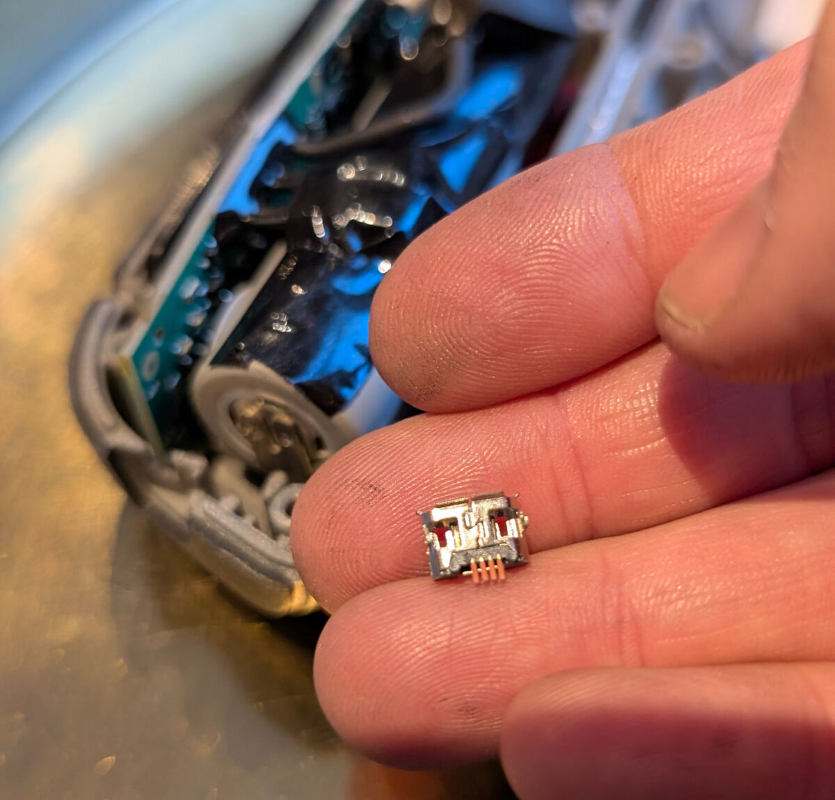 Loose charging port in hand