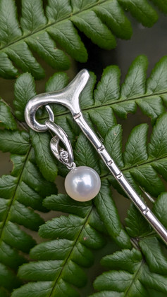 Zoom in of silver stirling memorial brooch