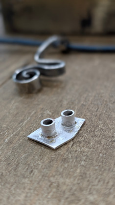 Two silver end caps