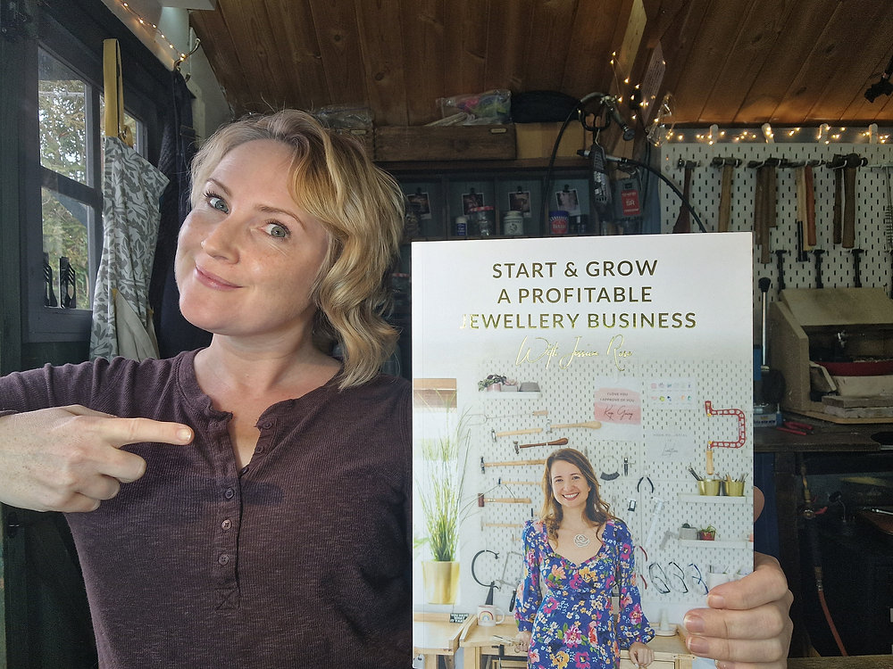 Kim pointing to a book